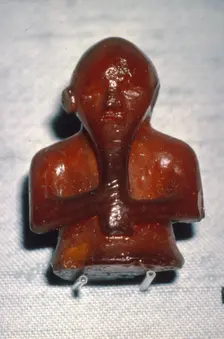 Amber Playing-Piece. Man with Long beard, from Roholte, Denmark, c8th-mid 11th century