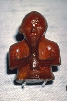 Amber Playing-Piece. Man with Long beard, from Roholte, Denmark, c8th-mid 11th century