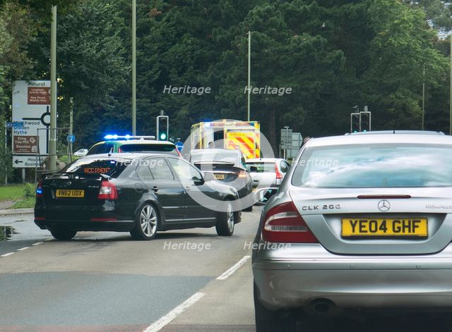Ambulance attending road traffic accident, A35 Hampshire 2017. Creator: Unknown.
