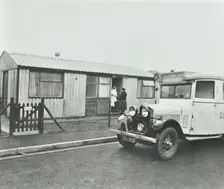 Ambulance delivering a cylinder of gas, Woolwich, London, 1946