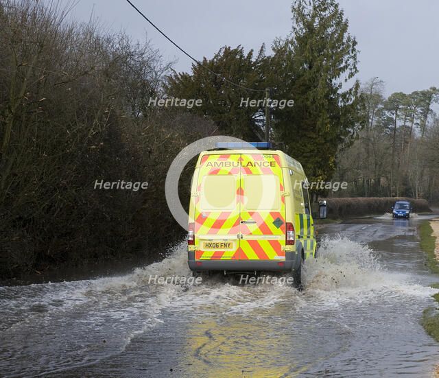 Ambulance driving through Floods at Beauleu 2008. Artist: Unknown.