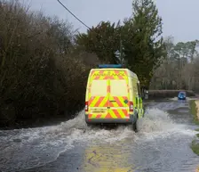 Ambulance driving through Floods at Beauleu 2008