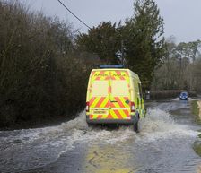 Ambulance driving through Floods at Beauleu 2008