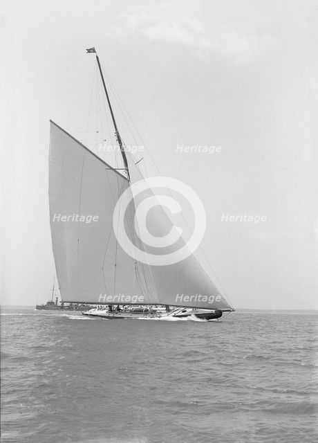 America's Cup challenger 'Shamrock IV' sailing without topsail, 1914. Creator: Kirk & Sons of Cowes.