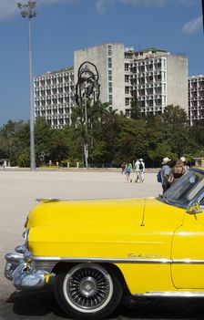 American Cadillac in front of a government building, Plaza de la Revolucion, Havana, Cuba, 2024. Creator: Ethel Davies