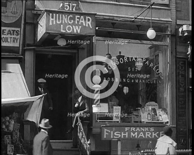 American Civilians Outside a Bobbing and Manicure Parlour, 1930s. Creator: British Pathe Ltd.