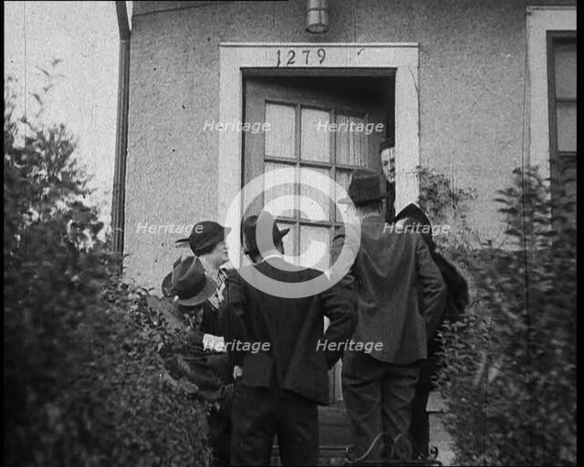American Civilians Outside Bruno Richard Hauptman's House in the Bronx, New York City, 1930s. Creator: British Pathe Ltd.