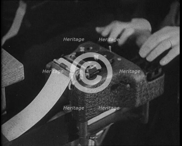 American Civilians Operating Stenotypes During the Lindbergh's Kidnapping Case Trial, 1930s. Creator: British Pathe Ltd.