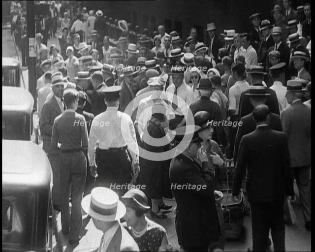 American Civilians Walking down the Streets of New York City, 1930. Creator: British Pathe Ltd.