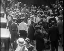 American Civilians Walking down the Streets of New York City, 1930. Creator: British Pathe Ltd
