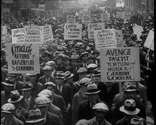 American anti-fascists Marching and Holding Signs, 1933. Creator: British Pathe Ltd