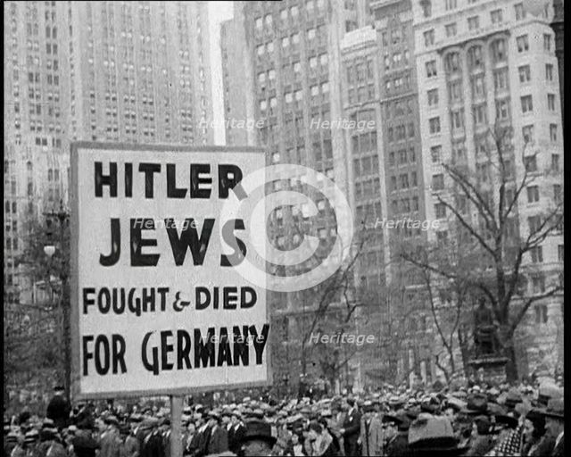 American anti-fascists Marching Holding a Sign Reading: 'Hitler Jews Fought & Died for..., 1933. Creator: British Pathe Ltd.