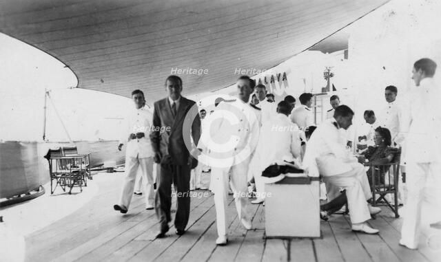 American actor and film director Douglas Fairbanks, Sr on board HMS 'Malaya', Venice, Italy 1938. Artist: Unknown