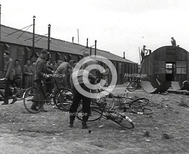 American Airmen Queueing up Outside a Building at an Airfield in England, 1943-1944. Creator: British Pathe Ltd.