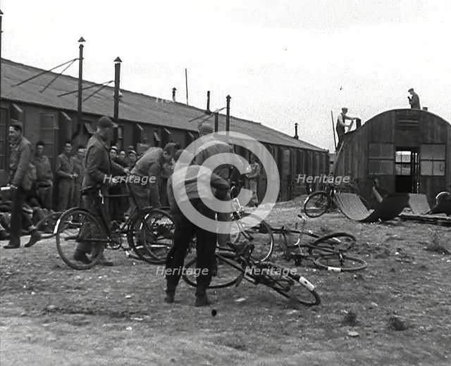 American Airmen Queueing up Outside a Building at an Airfield in England, 1943-1944. Creator: British Pathe Ltd.