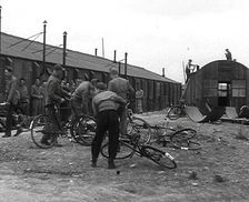 American Airmen Queueing up Outside a Building at an Airfield in England, 1943-1944. Creator: British Pathe Ltd