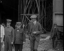 American Airship Crew Members Standing Outside the Hangar of an R 38 Airship in the United..., 1921. Creator: British Pathe Ltd
