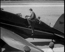 American Aviator Charles Augustus Lindbergh and His Wife Anne Morrow Lindbergh Embarking..., 1930s. Creator: British Pathe Ltd