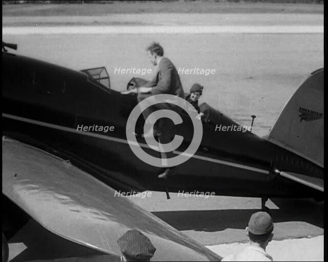 American Aviator Charles Augustus Lindbergh and His Wife Anne Morrow Lindbergh Embarking..., 1930s. Creator: British Pathe Ltd.