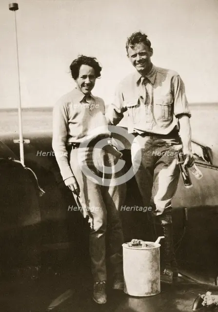 American aviator Charles Lindbergh and his wife Anne after their flight to Japan, 1931.  Creator: Unknown.