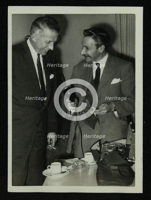 American bandleader Stan Kenton giving an interview, c1950s. Artist: Denis Williams
