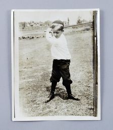 American golfer Bobby Jones playing as a young child, c1909