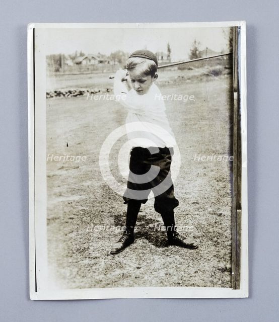 American golfer Bobby Jones playing as a young child, c1909.  Creator: Unknown.