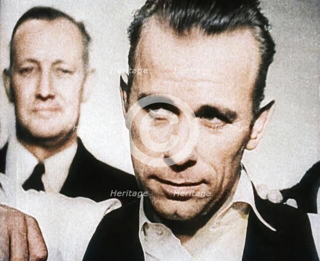 American Gangster John Herbert Dillinger Behind Bars, 1930s. Creator: British Pathe Ltd.