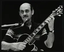 American guitarist Joe Pass playing at the Shaw Theatre, London, 31 July 1982. Creator: Denis Williams