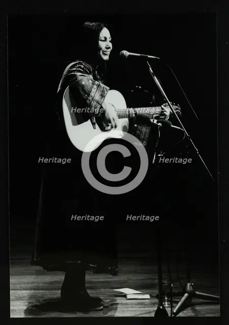 American folk musician Julie Felix on stage at the Forum Theatre, Hatfield, Hertfordshire, 1979. Creator: Denis Williams.