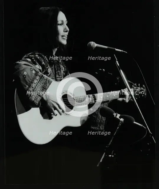 American folk musician Julie Felix performing at the Forum Theatre, Hatfield, Hertfordshire, March 1 Creator: Denis Williams.