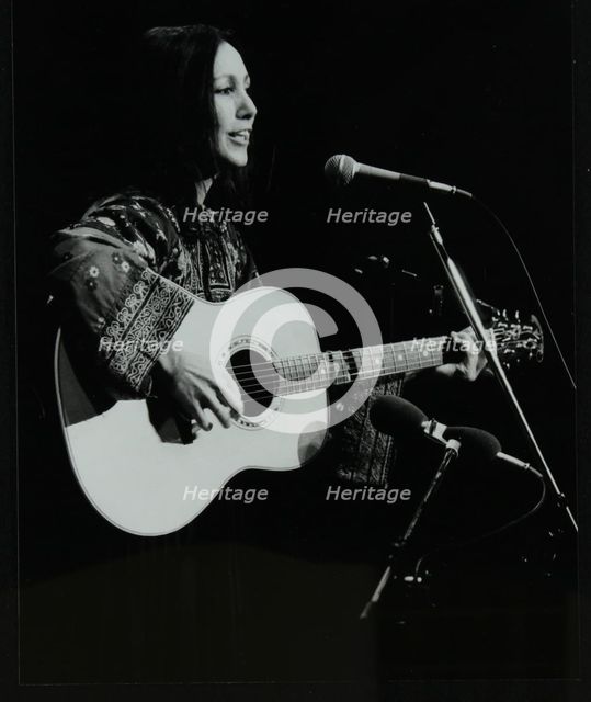 American folk musician Julie Felix performing at the Forum Theatre, Hatfield, Hertfordshire, March 1 Creator: Denis Williams.