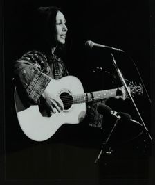 American folk musician Julie Felix performing at the Forum Theatre, Hatfield, Hertfordshire, March 1 Creator: Denis Williams