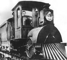 American inventor Thomas Alva Edison on board an electric railroad, 1892