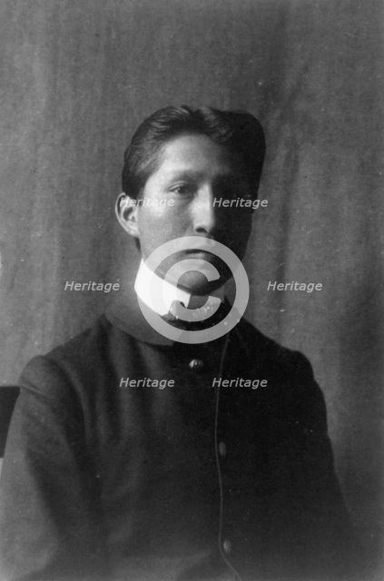 American Indian student, half-length portrait..., Hampton, Virginia, between 1899 and 1900. Creator: Frances Benjamin Johnston.