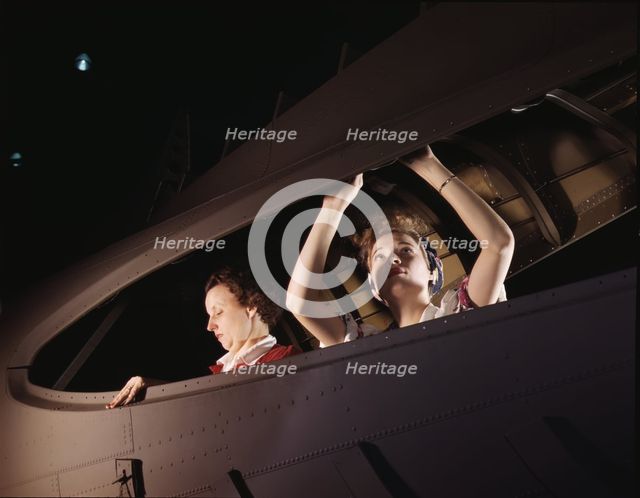 American mothers and sisters, like these women at the Douglas Aircraft..., Long Beach, Calif. , 1942 Creator: Alfred T Palmer.