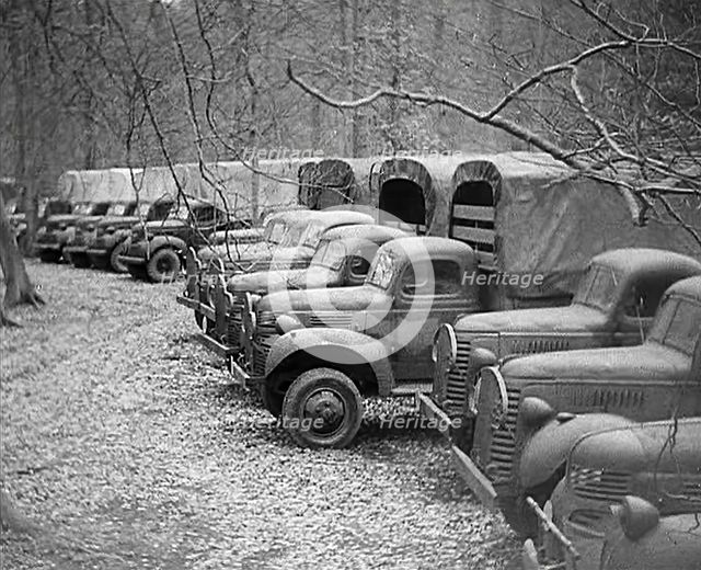 American Military Vehicles Lined up in the Woods Ready for the Opening of a Second Front, 1943-1944. Creator: British Pathe Ltd.