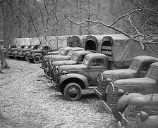 American Military Vehicles Lined up in the Woods Ready for the Opening of a Second Front, 1943-1944. Creator: British Pathe Ltd