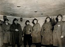 American soldiers examine a gas chamber, Dachau concentration camp, Bavaria, Germany, c1945. Creator: Unknown