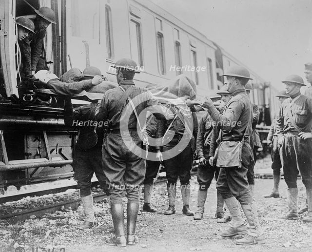 American soldiers & wounded, 27 Apr 1918. Creator: Bain News Service.