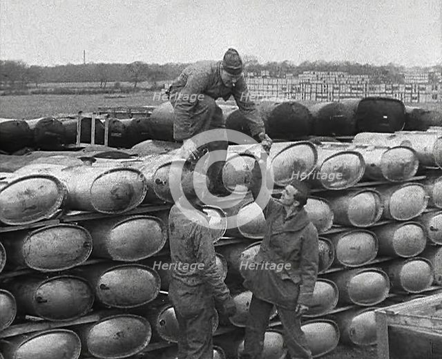 American Soldiers Working at a Fuel and Equipment Dump at an American Airfield in England, 1943-1944 Creator: British Pathe Ltd.