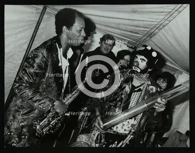 American saxophonist Ornette Coleman meets a clown, Bracknell Jazz Festival, Berkshire, 1978. Creator: Denis Williams.