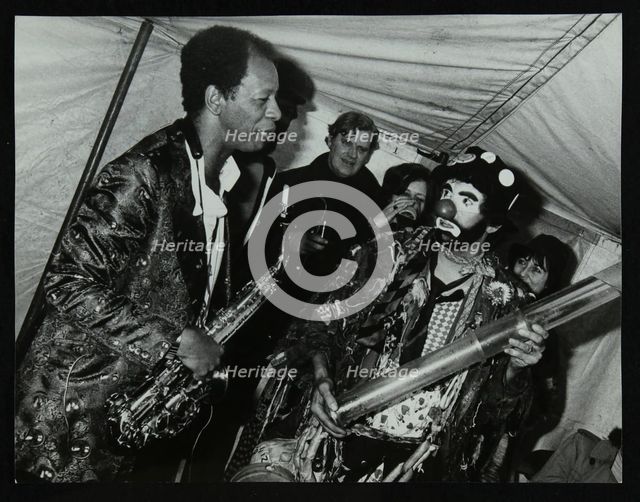 American saxophonist Ornette Coleman meets a clown, Bracknell Jazz Festival, Berkshire, 1978. Creator: Denis Williams.