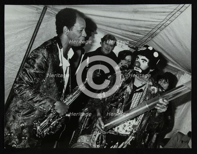 American saxophonist Ornette Coleman meets a clown, Bracknell Jazz Festival, Berkshire, 1978. Artist: Denis Williams