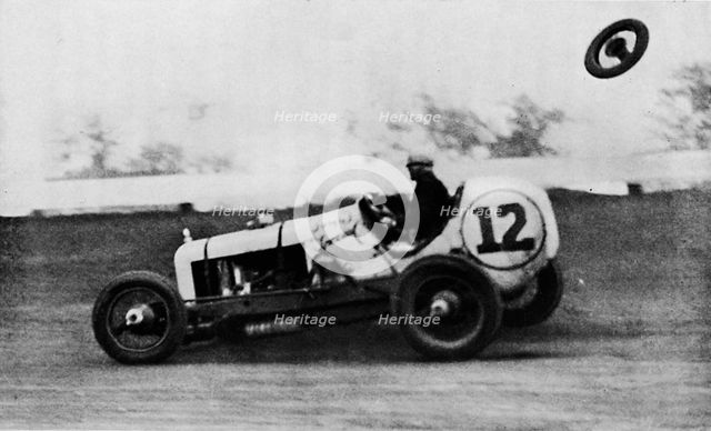 'American Speedway Racing - Jack Ericson, turning on three wheels, 1937. Artist: Unknown.