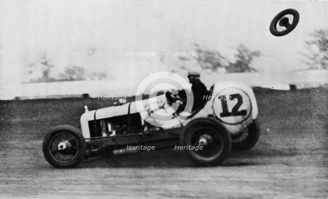 'American Speedway Racing - Jack Ericson, turning on three wheels, 1937. Artist: Unknown.