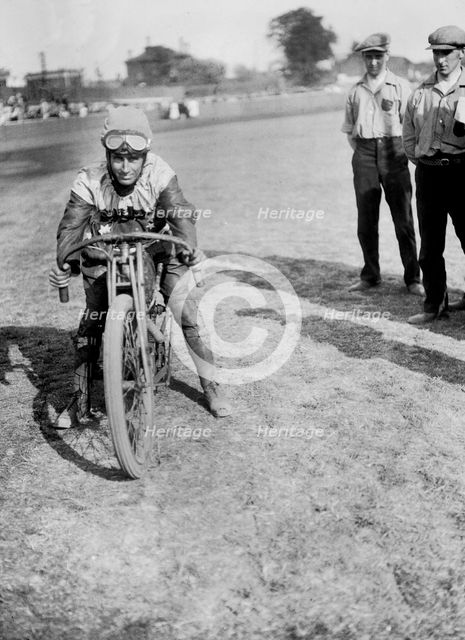 American speedway rider Art Pecha on his Harley-Davidson, Lea Bridge Stadium, Leyton, London, 1928.  Artist: Bill Brunell.