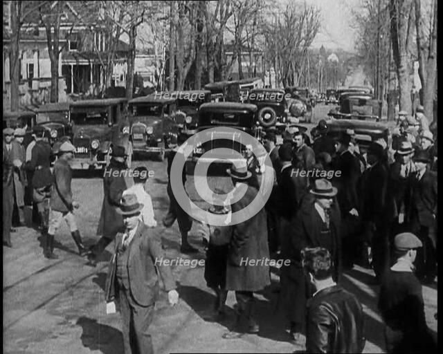 American Police Officers and Members of the Press on the Streets of New Jersey, 1930s. Creator: British Pathe Ltd.