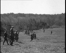 American Police Officers Searching the Area Outside American Aviator Charles Augustus..., 1930s. Creator: British Pathe Ltd