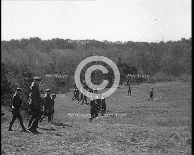 American Police Officers Searching the Area Outside American Aviator Charles Augustus..., 1930s. Creator: British Pathe Ltd.